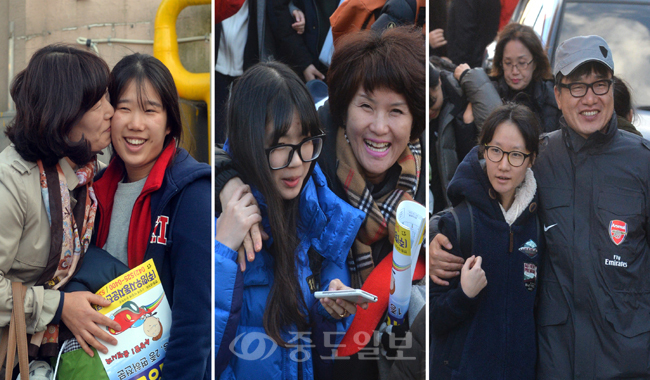 ▲ “내딸, 고생했어” 2015학년도 대학수학능력시험이 치러진 13일 대전 중구 호수돈여고에서 시험을 마친 수험생들이 부모의 격려를 받으며 고사장을 나서고 있다. 이성희 기자 token77@