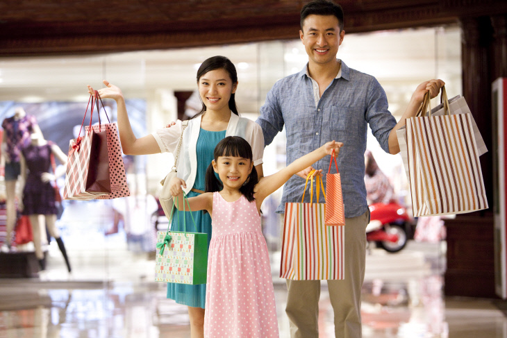 Family shopping in department store