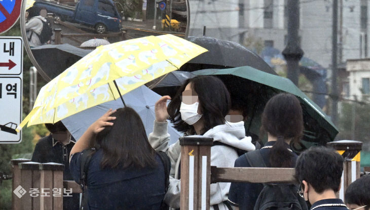 폭염 날리는 가을비