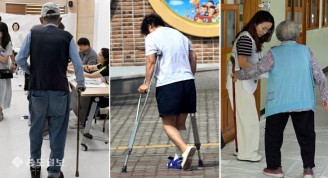 ‘거동이 불편해도 투표는 해야죠’